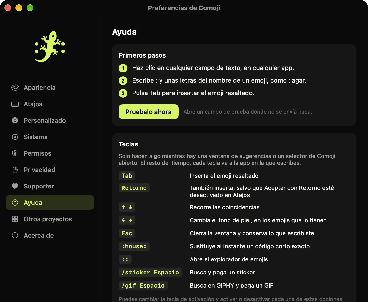Preferencias de Comoji abiertas en la pestaña Ayuda, con primeros pasos y una tabla de todas las teclas